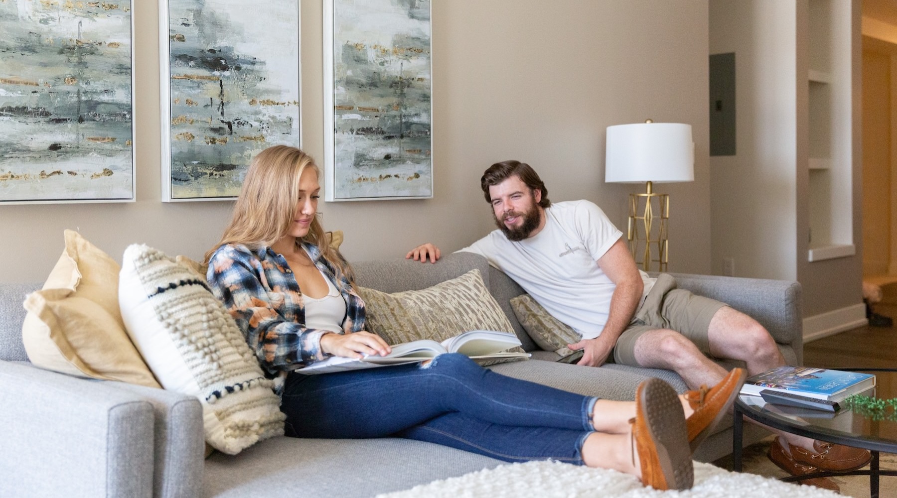 a man and a woman sitting on a couch